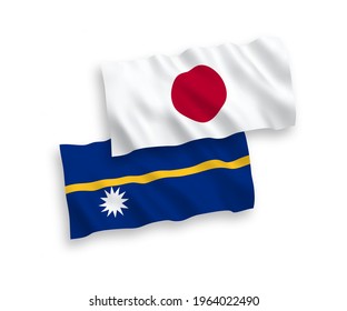 National vector fabric wave flags of Japan and Republic of Nauru isolated on white background. 1 to 2 proportion.