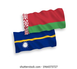 National vector fabric wave flags of Republic of Nauru and Belarus isolated on white background. 1 to 2 proportion.