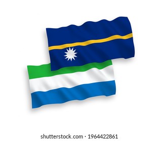 National vector fabric wave flags of Republic of Nauru and Sierra Leone isolated on white background. 1 to 2 proportion.