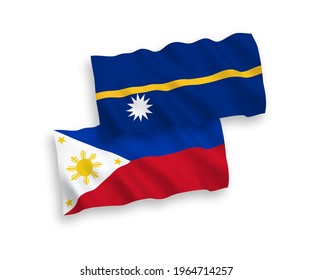 Banderas de olas de tela vectorial nacional de la República de Nauru y Filipinas aisladas en fondo blanco. de 1 a 2.