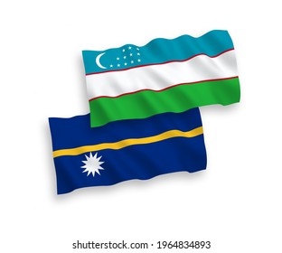 National vector fabric wave flags of Republic of Nauru and Uzbekistan isolated on white background. 1 to 2 proportion.