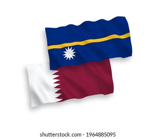 National vector fabric wave flags of Republic of Nauru and Qatar isolated on white background. 1 to 2 proportion.