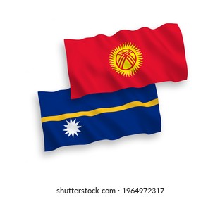 National vector fabric wave flags of Republic of Nauru and Kyrgyzstan isolated on white background. 1 to 2 proportion.