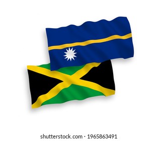 National vector fabric wave flags of Republic of Nauru and Jamaica isolated on white background. 1 to 2 proportion.