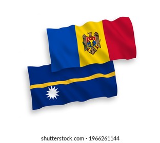 National vector fabric wave flags of Republic of Nauru and Moldova isolated on white background. 1 to 2 proportion.