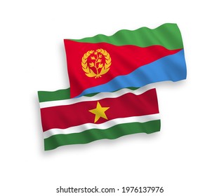 National vector fabric wave flags of Eritrea and Republic of Suriname isolated on white background. 1 to 2 proportion.3D