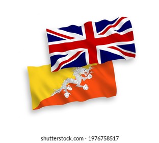 National vector fabric wave flags of Great Britain and Kingdom of Bhutan isolated on white background. 1 to 2 proportion.