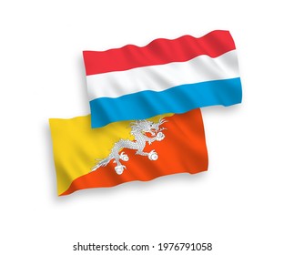National vector fabric wave flags of Kingdom of Bhutan and Luxembourg isolated on white background. 1 to 2 proportion.