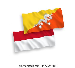 National vector fabric wave flags of Indonesia and Kingdom of Bhutan isolated on white background. 1 to 2 proportion.