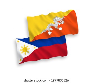 National vector fabric wave flags of Kingdom of Bhutan and Philippines isolated on white background. 1 to 2 proportion.