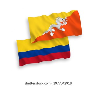 National vector fabric wave flags of Kingdom of Bhutan and Colombia isolated on white background. 1 to 2 proportion.