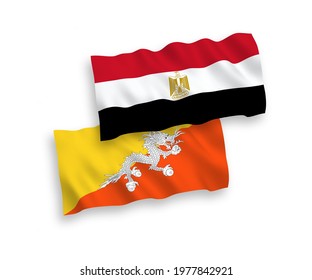 National vector fabric wave flags of Kingdom of Bhutan and Egypt isolated on white background. 1 to 2 proportion.