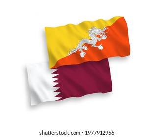 National vector fabric wave flags of Kingdom of Bhutan and Qatar isolated on white background. 1 to 2 proportion.