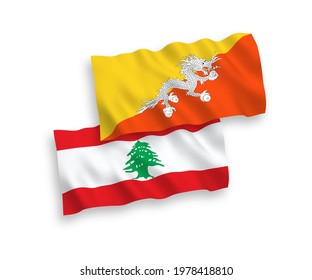 National vector fabric wave flags of Kingdom of Bhutan and Lebanon isolated on white background. 1 to 2 proportion.