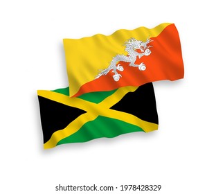 National vector fabric wave flags of Kingdom of Bhutan and Jamaica isolated on white background. 1 to 2 proportion.