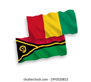 National vector fabric wave flags of Republic of Vanuatu and Guinea isolated on white background. 1 to 2 proportion.