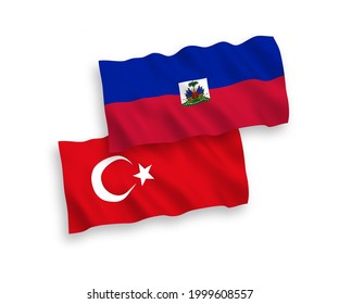 National vector fabric wave flags of Turkey and Republic of Haiti isolated on white background. 1 to 2 proportion.