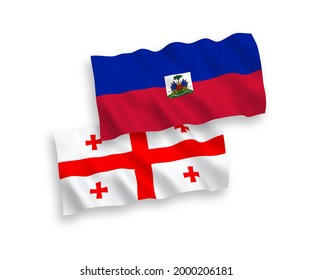 National vector fabric wave flags of Republic of Haiti and Georgia isolated on white background. 1 to 2 proportion.