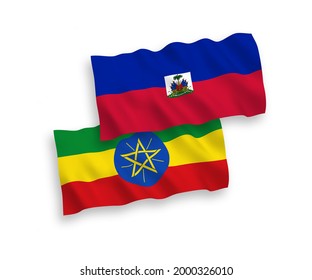National vector fabric wave flags of Republic of Haiti and Ethiopia isolated on white background. 1 to 2 proportion.
