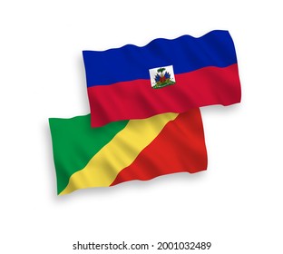 National vector fabric wave flags of Republic of Haiti and Republic of the Congo isolated on white background. 1 to 2 proportion.