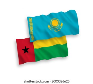 National vector fabric wave flags of Kazakhstan and Republic of Guinea Bissau isolated on white background. 1 to 2 proportion.