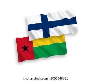 National vector fabric wave flags of Finland and Republic of Guinea Bissau isolated on white background. 1 to 2 proportion.