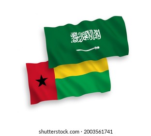 National vector fabric wave flags of Saudi Arabia and Republic of Guinea Bissau isolated on white background. 1 to 2 proportion.