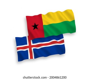 National vector fabric wave flags of Republic of Guinea Bissau and Chile isolated on white background. 1 to 2 proportion.