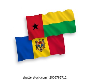 National vector fabric wave flags of Republic of Guinea Bissau and Moldova isolated on white background. 1 to 2 proportion.
