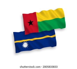 National vector fabric wave flags of Republic of Guinea Bissau and Republic of Nauru isolated on white background. 1 to 2 proportion.