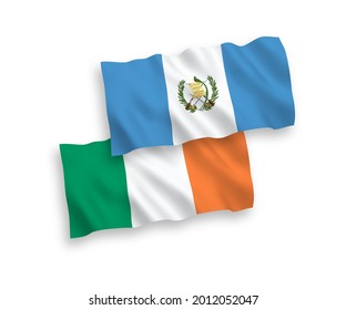 National vector fabric wave flags of Ireland and Republic of Guatemala isolated on white background. 1 to 2 proportion.