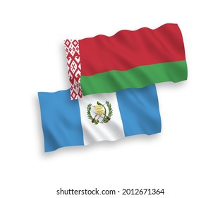 National vector fabric wave flags of Republic of Guatemala and Belarus isolated on white background. 1 to 2 proportion.