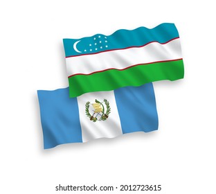 National vector fabric wave flags of Republic of Guatemala and Uzbekistan isolated on white background. 1 to 2 proportion.
