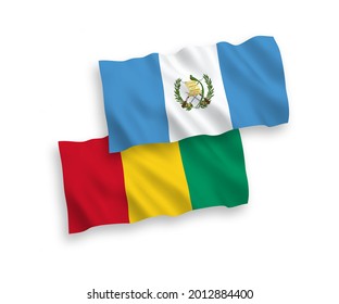 National vector fabric wave flags of Republic of Guatemala and Guinea isolated on white background. 1 to 2 proportion.