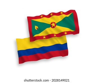 National vector fabric wave flags of Grenada and Colombia isolated on white background. 1 to 2 proportion.