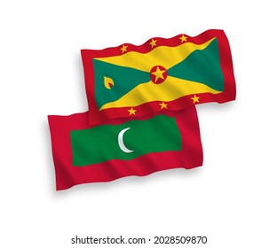 National vector fabric wave flags of Grenada and Maldives isolated on white background. 1 to 2 proportion.