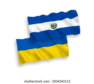 National vector fabric wave flags of Republic of El Salvador and Ukraine isolated on white background. 1 to 2 proportion.