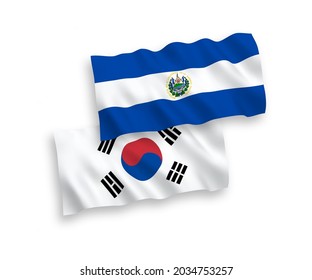 National vector fabric wave flags of South Korea and Republic of El Salvador isolated on white background. 1 to 2 proportion.
