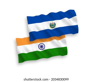 National vector fabric wave flags of India and Republic of El Salvador isolated on white background. 1 to 2 proportion.