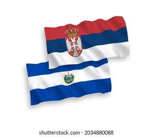 National vector fabric wave flags of Republic of El Salvador and Serbia isolated on white background. 1 to 2 proportion.
