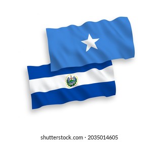 National vector fabric wave flags of Republic of El Salvador and Somalia isolated on white background. 1 to 2 proportion.