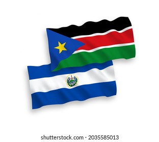 National vector fabric wave flags of Republic of El Salvador and Republic of South Sudan isolated on white background. 1 to 2 proportion.