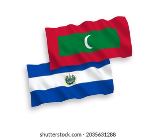 National vector fabric wave flags of Republic of El Salvador and Maldives isolated on white background. 1 to 2 proportion.