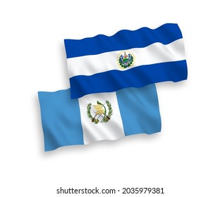 National vector fabric wave flags of Republic of El Salvador and Republic of Guatemala isolated on white background. 1 to 2 proportion.