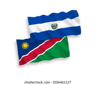 National vector fabric wave flags of Republic of El Salvador and Republic of Namibia isolated on white background. 1 to 2 proportion.