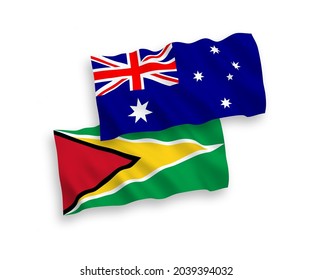 National vector fabric wave flags of Australia and Co-operative Republic of Guyana isolated on white background. 1 to 2 proportion.