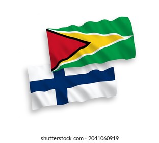 National vector fabric wave flags of Finland and Co-operative Republic of Guyana isolated on white background. 1 to 2 proportion.