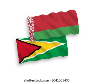 National vector fabric wave flags of Co-operative Republic of Guyana and Belarus isolated on white background. 1 to 2 proportion.