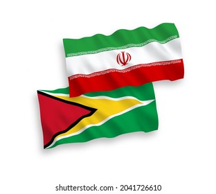 National vector fabric wave flags of Co-operative Republic of Guyana and Iran isolated on white background. 1 to 2 proportion.