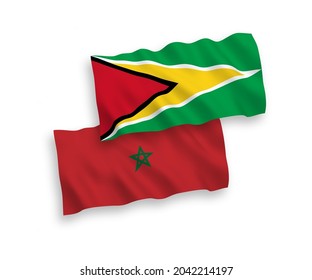 National vector fabric wave flags of Co-operative Republic of Guyana and Morocco isolated on white background. 1 to 2 proportion.